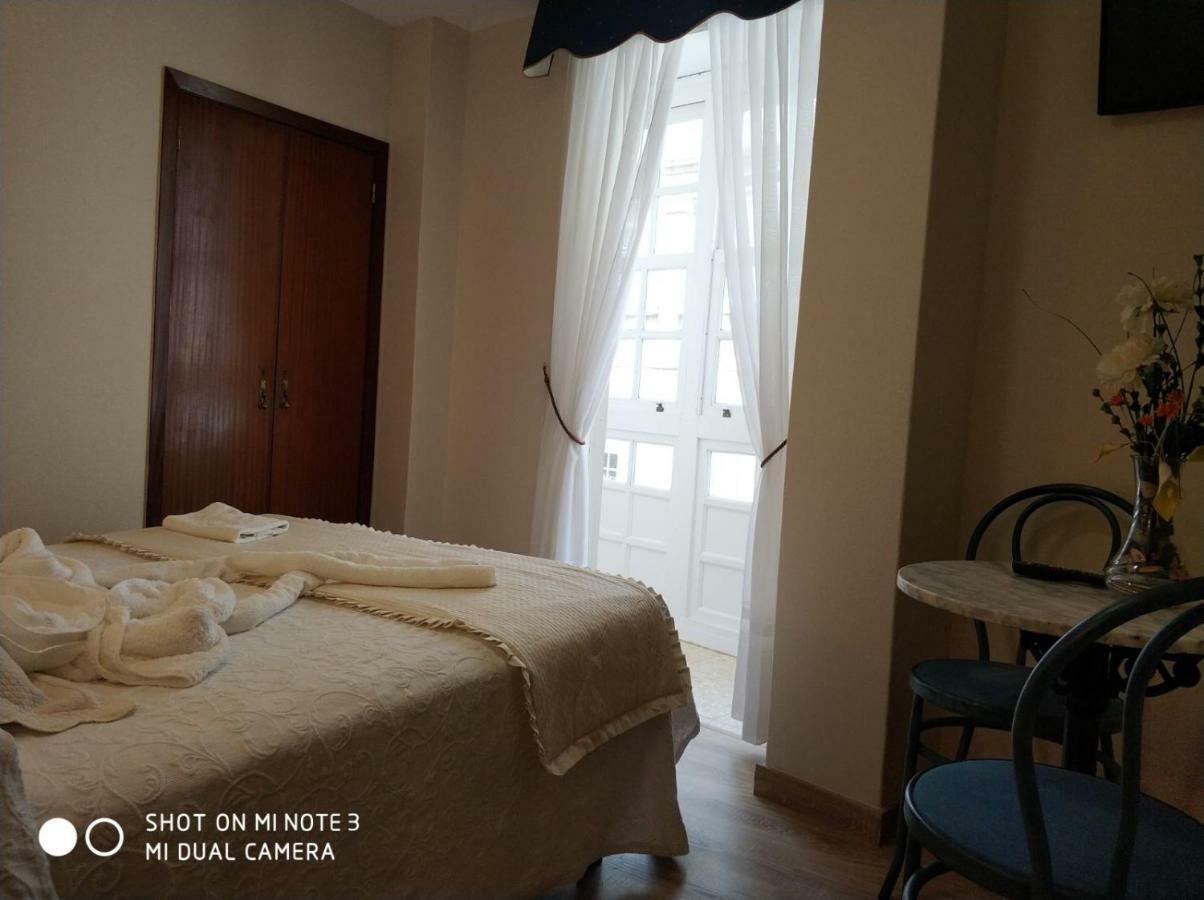 Pension Pura Cuntis Buitenkant foto