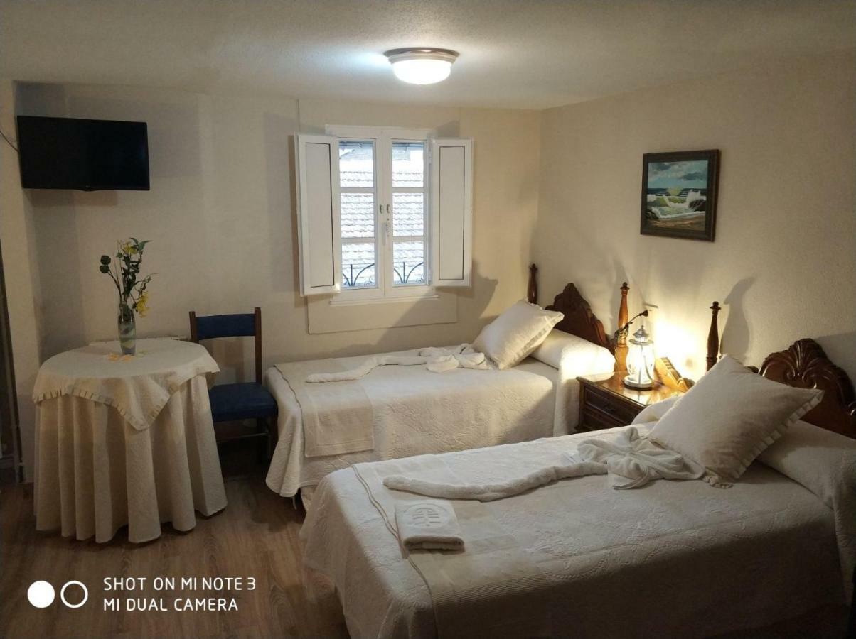 Pension Pura Cuntis Buitenkant foto