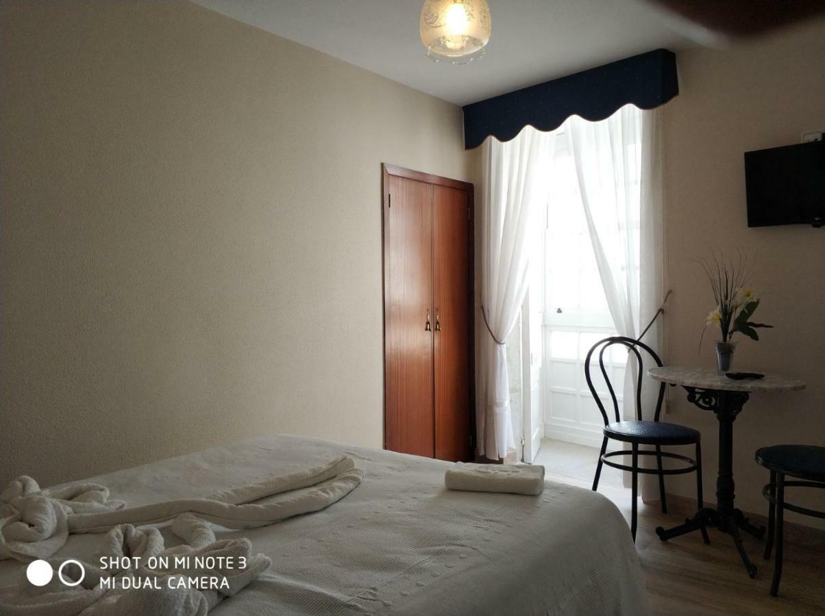 Pension Pura Cuntis Buitenkant foto